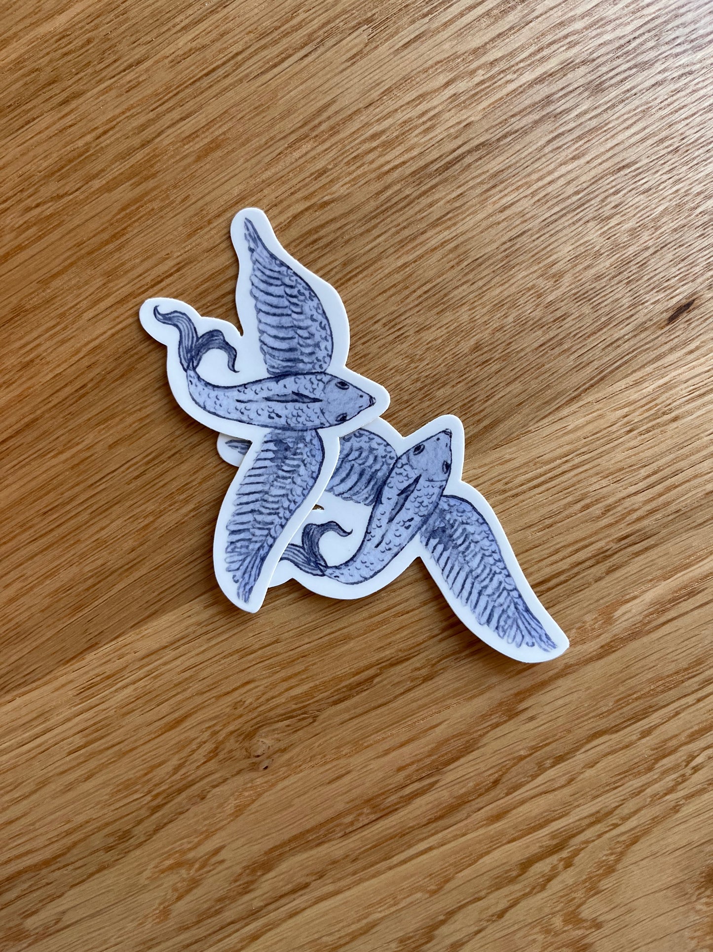 Dusty Blue flying fish vinyl sticker.