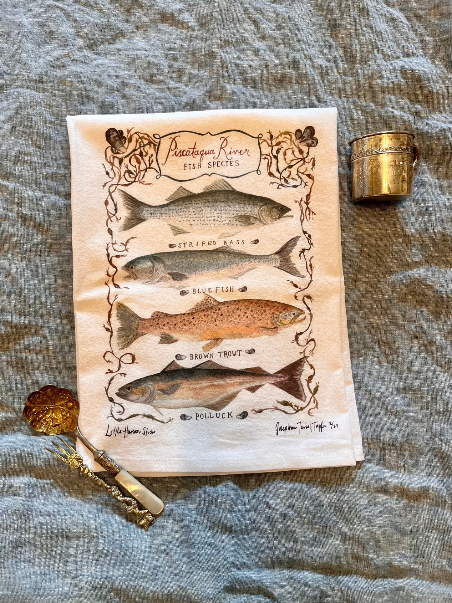 Hand painted tea towel with Piscataqua River fish including Striped Bass, Bluefish, Brown Trout &amp; Polluck with hand painted seaweed and Atlantic mussels shells.